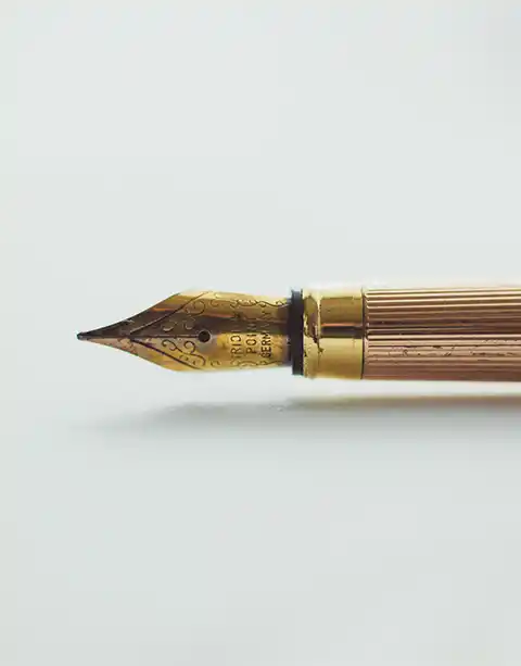 An ornate fountain pen nib.